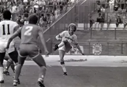 Ashley Grimes lofts the ball forward