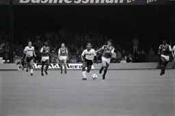 Mark Stein leaves Tony Adams in his wake