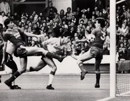 Mike Newell stoops to head in Town`s fourth goal and completes his hat-trick