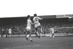 Mark Stein has just scored the only goal of the game Mike Newell joins in the celebrations