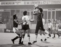 Les Sealey has the ball safely in his hands as Town repel another Charlton attack