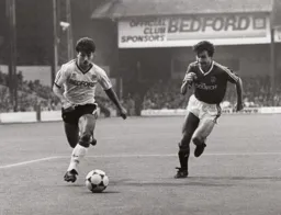 Rob Johnson gets past Mark Reid