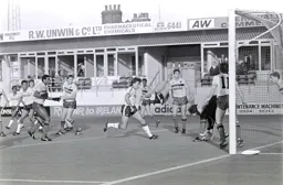 Tony Coton picks the ball up from the advancing Mal Donaghy