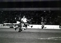 Mike Newell holds off Chris Fairclough to score Town`s second goal