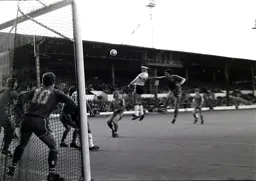 Steve Foster flies in with a header