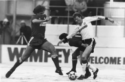 Ashley Grimes controls the ball on the snow covered plastic pitch
