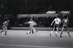 All eyes follow the ball as Mick Harford takes a shot at goal