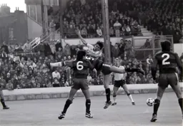 Mick Harford and Alan McDonald get into a bit of a tangle