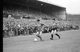 Mike Newell shields the ball