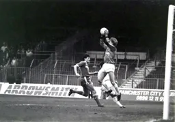 Perry Suckling cuts out a cross into the box meant for Mick Harford