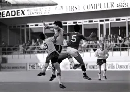 Mike Newell, Mick Harford and Paul McGrath get into a right old tangle