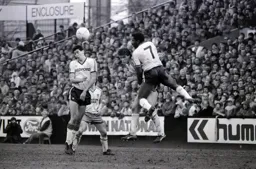 Ricky Hill and Tony Spearing clash while Mike Newell looks the other way