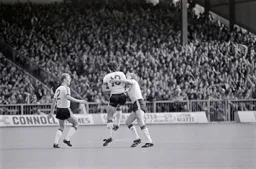 Mick Harford`s early goal is acclaimed by Tim Breacker and Stacey North