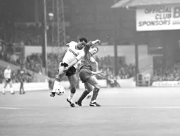 Brian Stein takes the ball past Andy Thorn