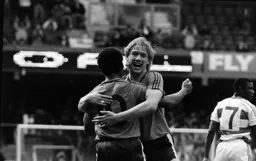 Stacey North gives Mark Stein a hug after Stein had scored the Town`s first goal