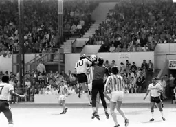 Mick Harford goes for the ball as City keeper Steve Ogrizovic attempts to punch it away