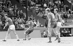 Gary Cobb watches as Ricky Hill takes a shot at goal