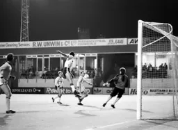 Mike Newell just fails to connect with the ball