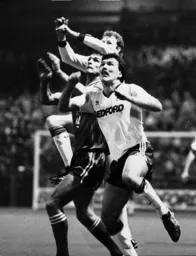 Luton go down 1-0 to table topping Liverpool, debutant Ian Allinson and Ashley Grimes battling with Gillespie