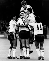 The players celebrate Grimes brilliant left foot strike