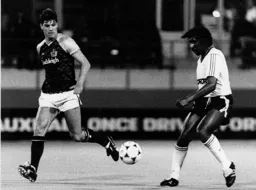 Ricky Hill is closed down by Paul Comstive