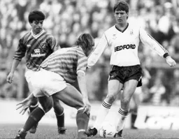 Steve Williams takes on the Millwall defence