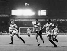 Roy Wegerle in a race for the ball with Brian Gayle