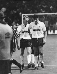 John Dreyer and a smiling Iain Dowie leave the firld at the final whistle