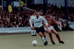 David Preece is closely marked by Paul Beesley