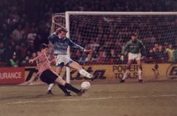 Lars Elstrup moves in to block a shot