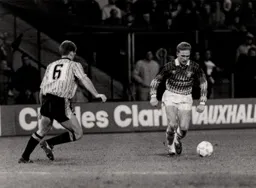 Mark Pembridge is closed down by Colin Hill