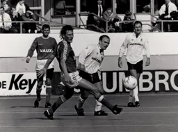 David Preece knocks the ball past Colin Pascoe