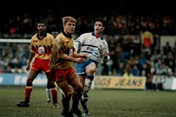 Ceri Hughes chips the ball forward