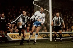 John Dreyer is held off by Liam O'Brien