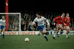 Paul Telfer looks to set up another attack, watched by former Hatter Mark Aizlewood
