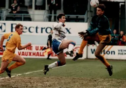 Phil Gray seems to have beaten the goalkeeper but the effort drifts wide