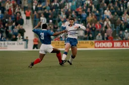 Phil Gray in a battle for the ball