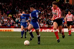 Phil Gray steals a march on Terry Butcher