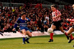 Paul Telfer gets the ball across