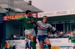 Kerry Dixon in a battle with Steve Welsh