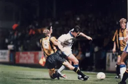 Ceri Hughes is tackled by Mick Heathcote