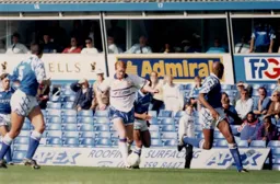 John Hartson runs at the City defence