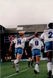 John Hartson salutes his goal