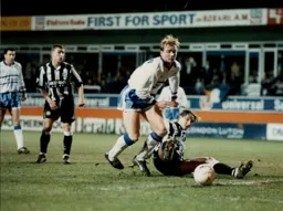 The ball just evades John Hartson