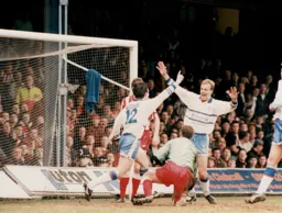 Ceri Hughes and Kerry Dixon celebrate Hughes`s goal