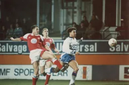 Mark Burke gets past two Middlesbrough defenders