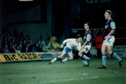 Scott Oakes has just scored his and Town`s first goal. Steve Potts and Tim Breacker can hardly believe it