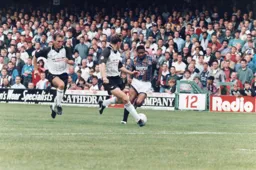 Dwight Marshall tries to outpace the Derby defence