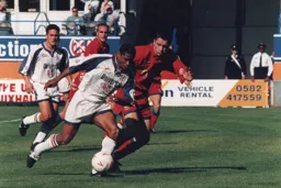 Dwight Marshall tries to wriggle through