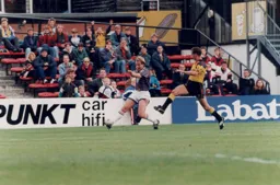 Kerry Dixon gets the ball across